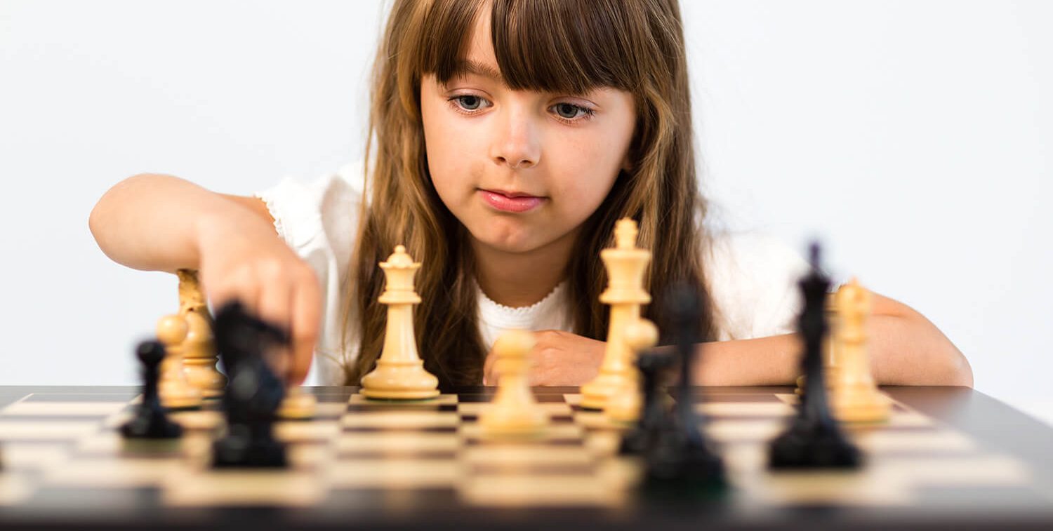 Child playing chess