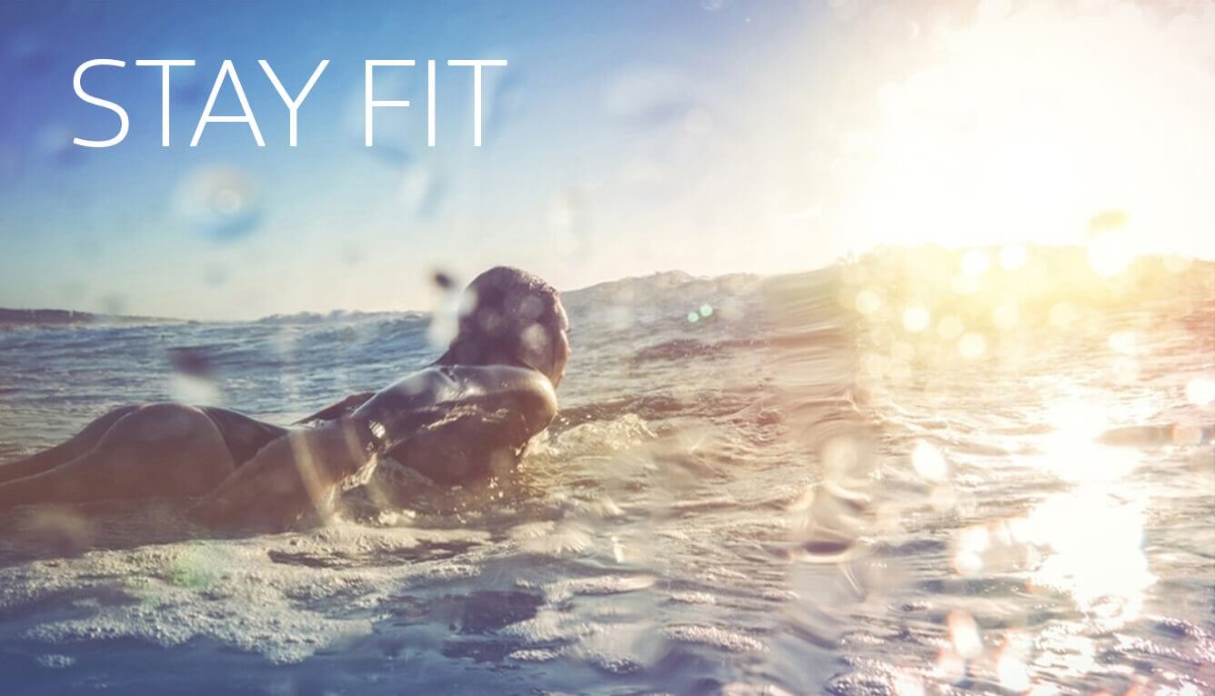 Surfer girl in the ocean, advocate of Norway Omega